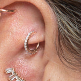 Luxury 14K gold rook clicker with gemstones – bold and elegant design