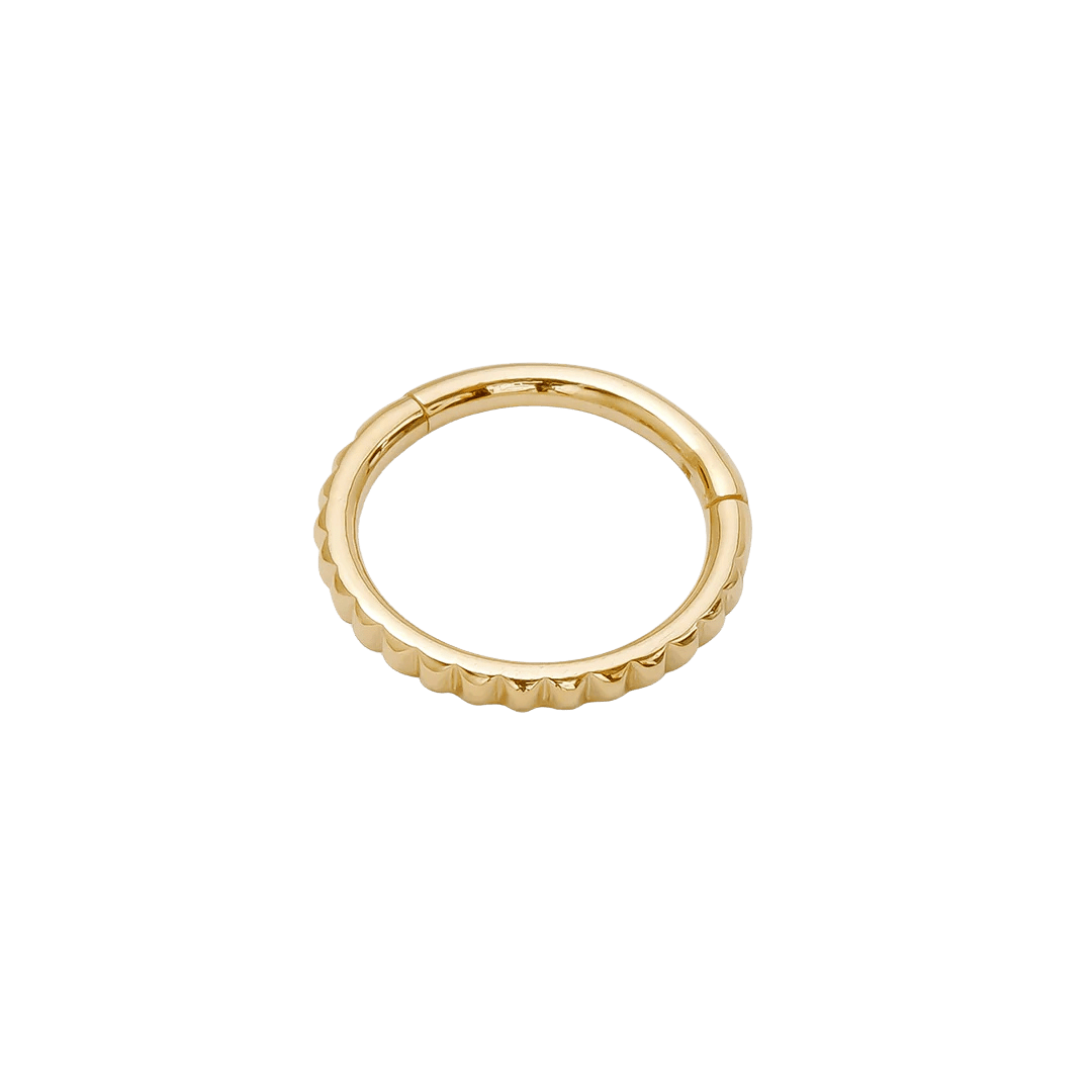 Close-up of Tokyo Clicker’s textured gold detailing