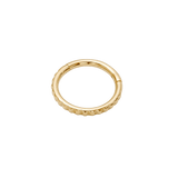 Close-up of Tokyo Clicker’s textured gold detailing