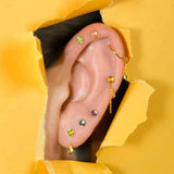 Close-up of aquamarine threadless end with modern bezel