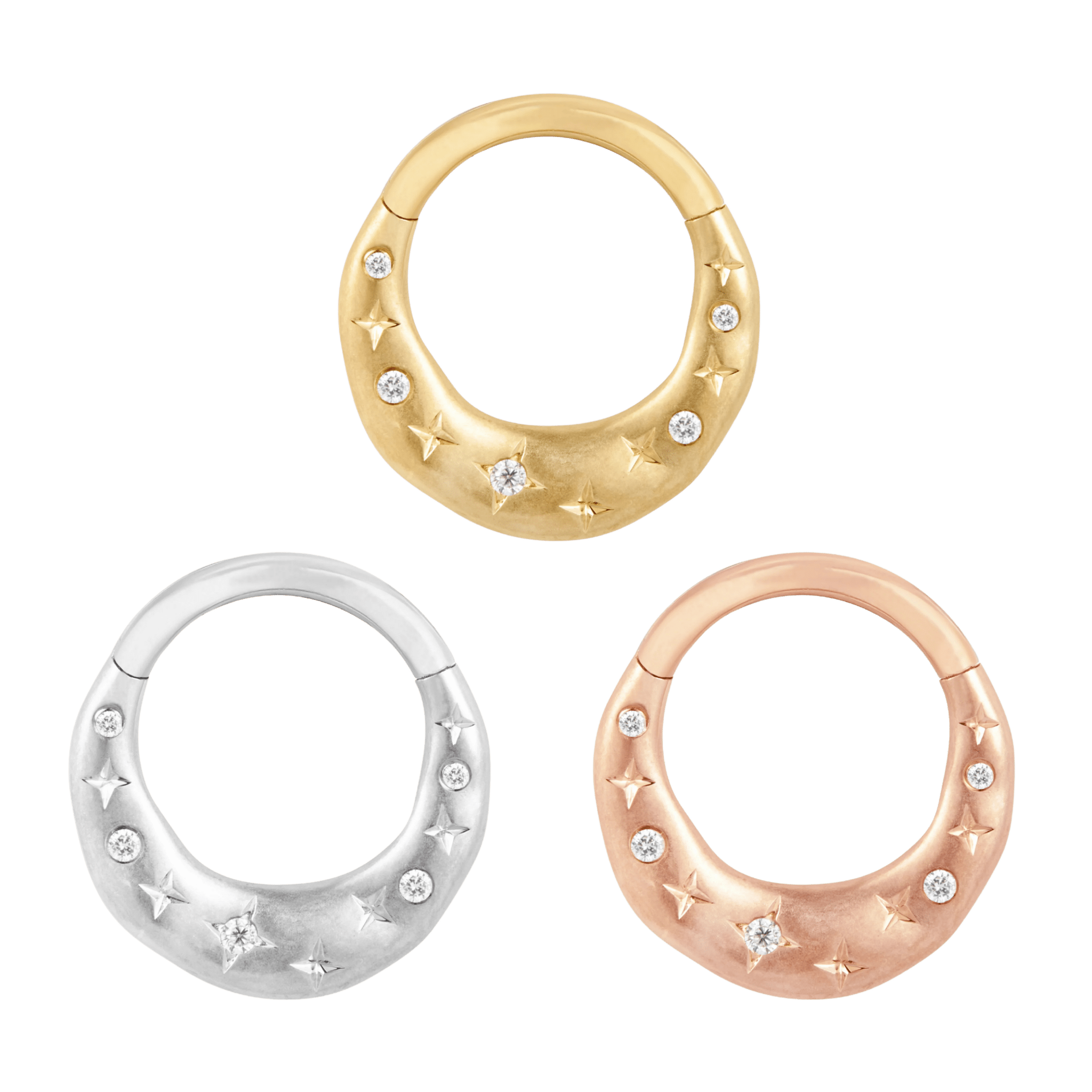 Close-up of star-inspired 14K gold clicker with CZs