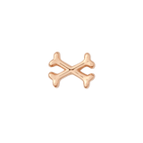 Edgy gold piercing charm in crossbones design