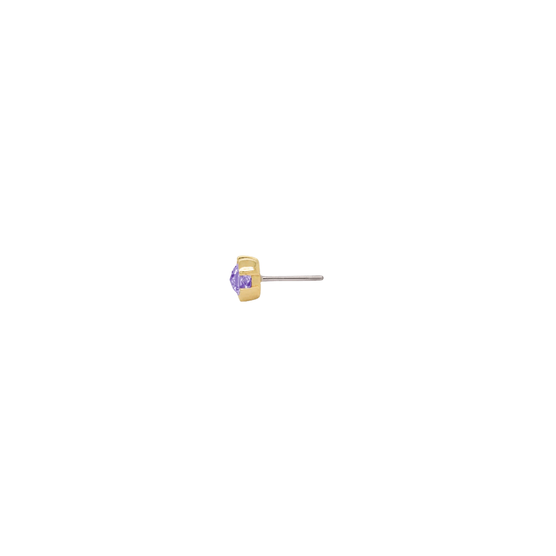 Flat-lay of 14k gold Peekaboo end featuring rose-cut amethyst