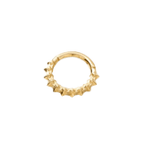 Minimalist flat lay of Sydney Clicker in yellow gold