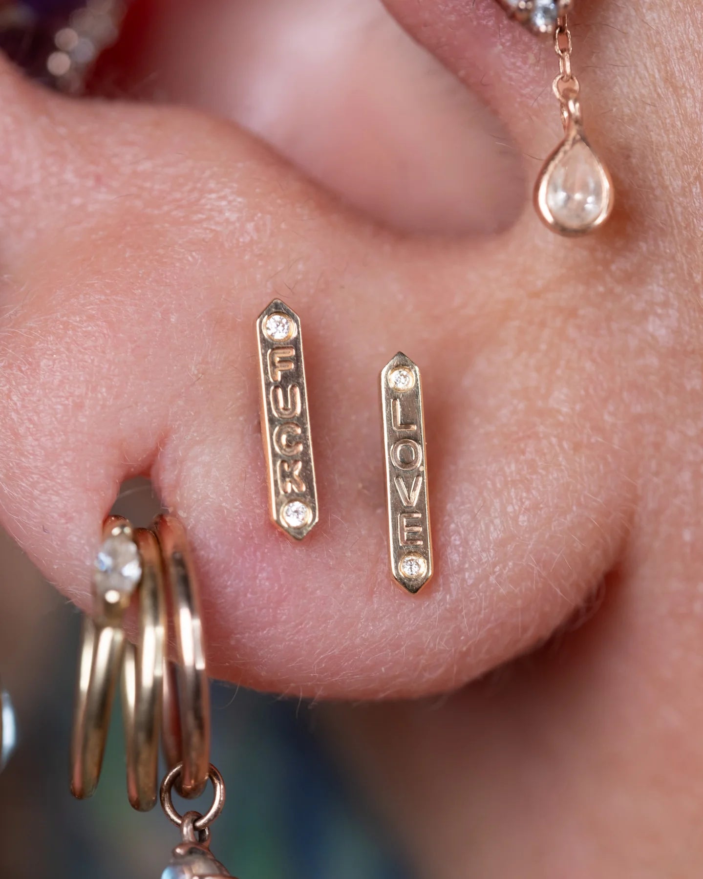 Model Wearing “LOVE” End in Helix Piercing – Romantic Minimalism