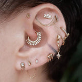 Model Wearing Luminary Charm in Conch Piercing – Studio Light