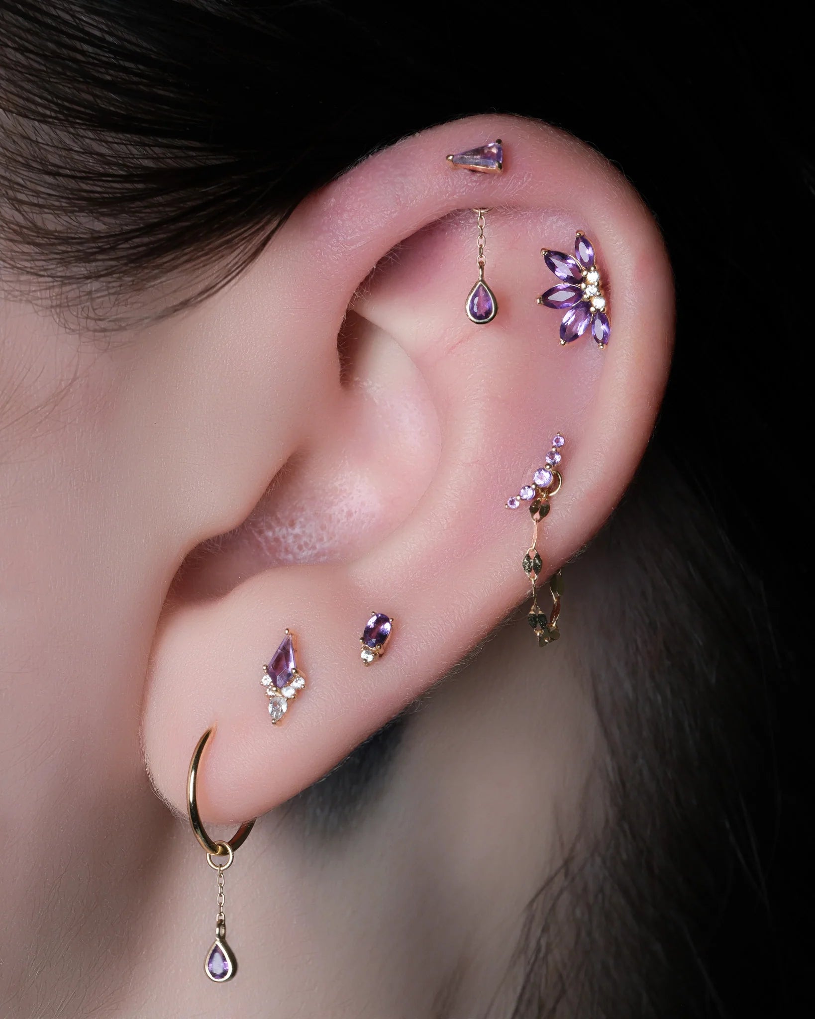 Model wearing Concorde Amethyst Chain Charm in Helix Piercing