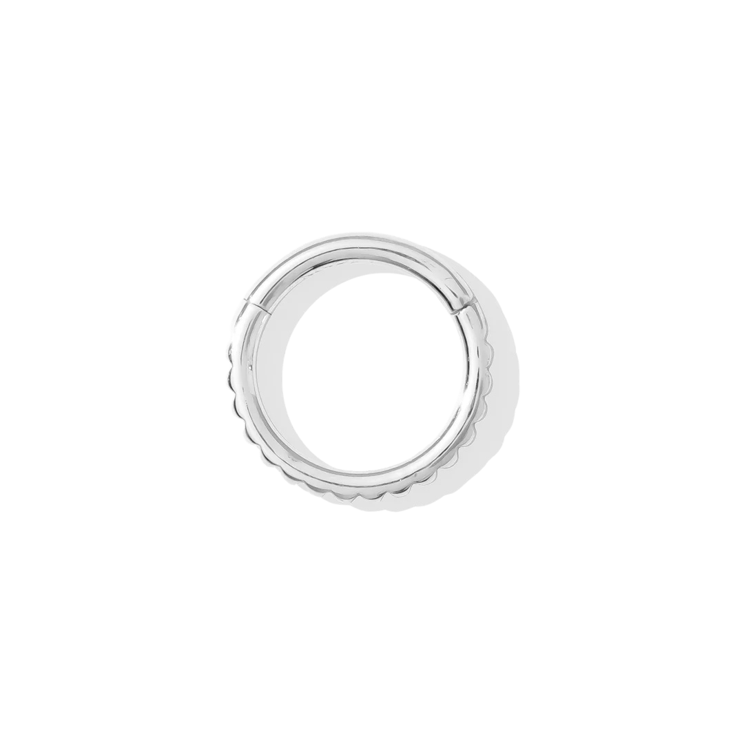 Overhead flat lay of Tokyo 14k gold clicker ring