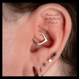 Model Wearing Rise in Septum Piercing – Matte Side Forward