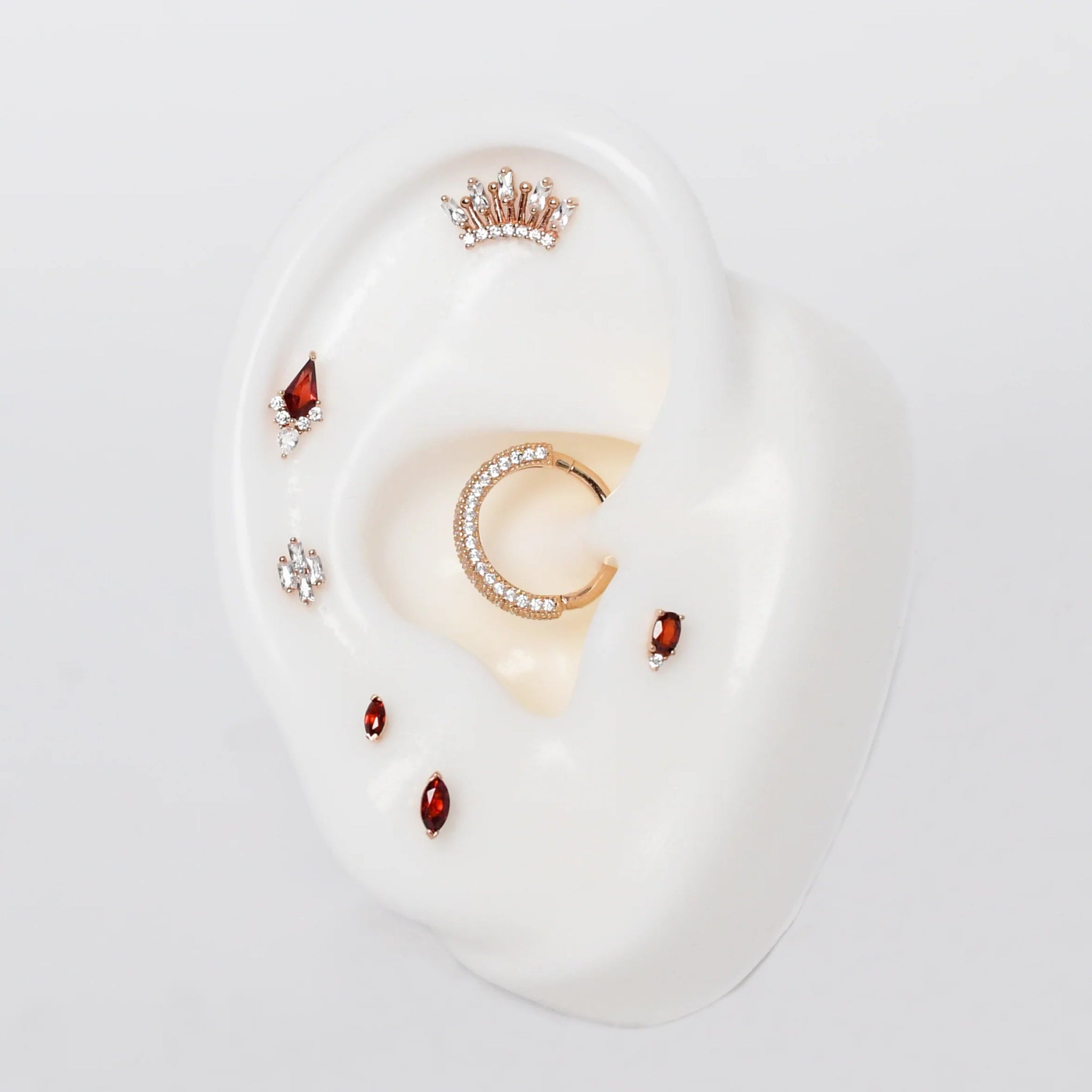 Small and Large Garnet Zuri Ends Side by Side on Neutral Background