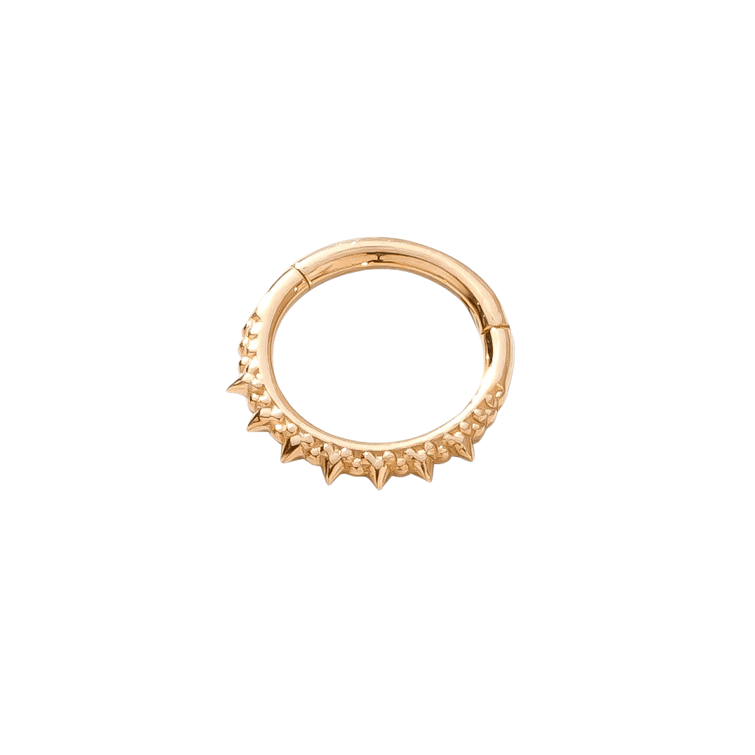 Solid gold clicker with bold spike accents for septum piercings