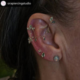 Luthier in Yellow Gold Draping Between Helix and Flat Piercings
