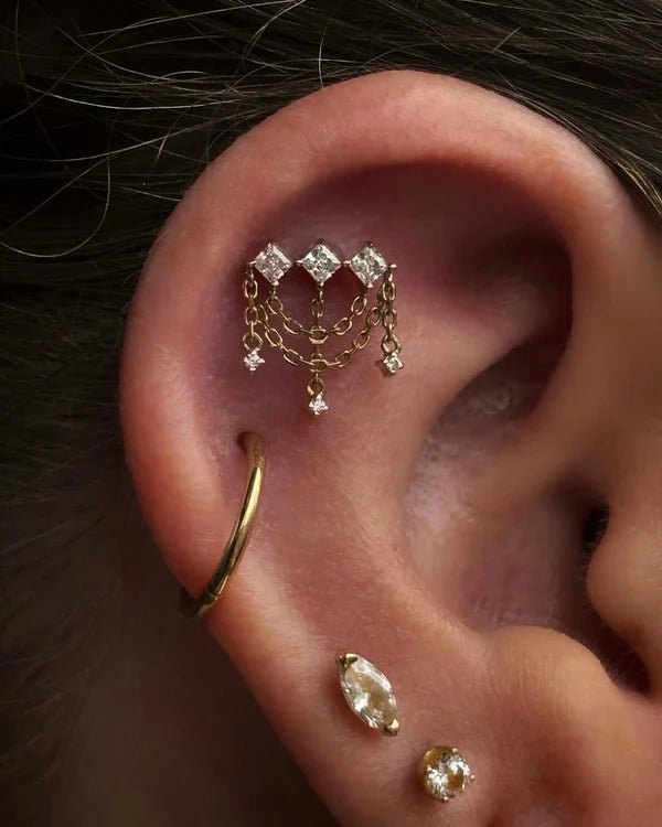 Elegant gold chains with CZ drops on piercing charm