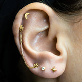Model Wearing Box Chain Between Lobe Piercings – Clean Look