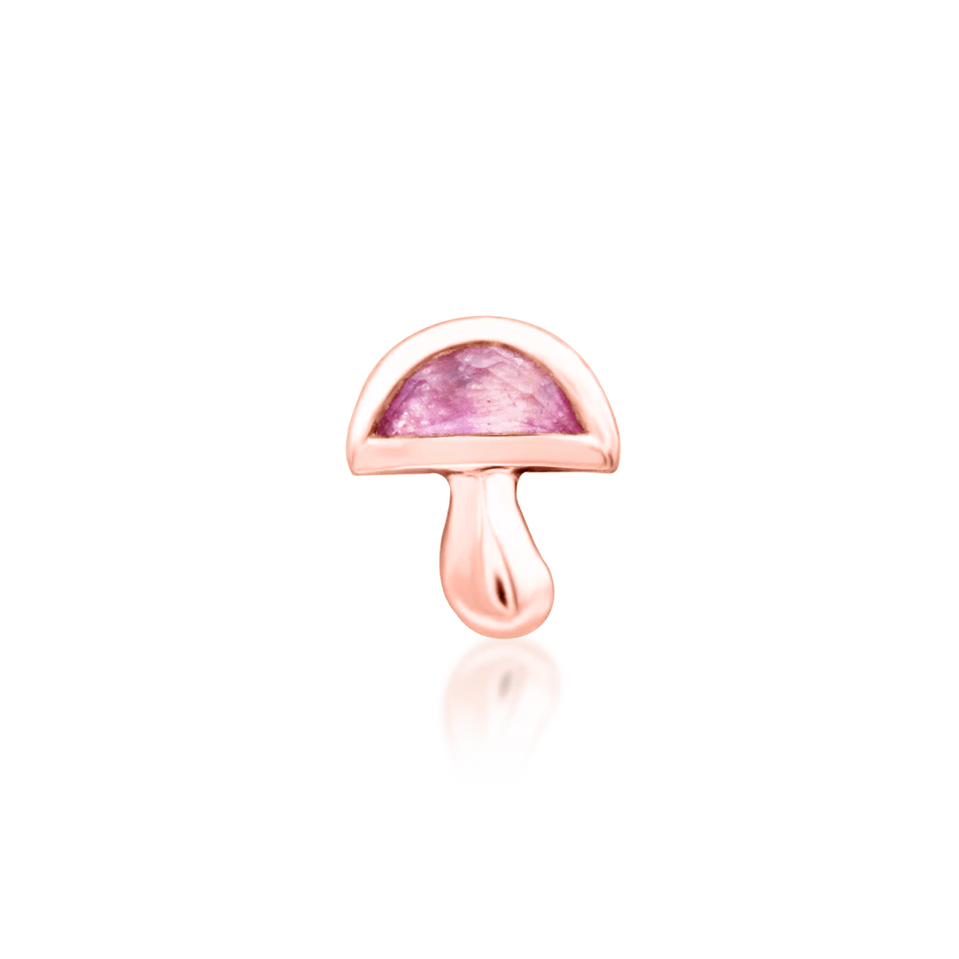 Side profile of Amanita in rose gold – sculpted form and bright pink accent