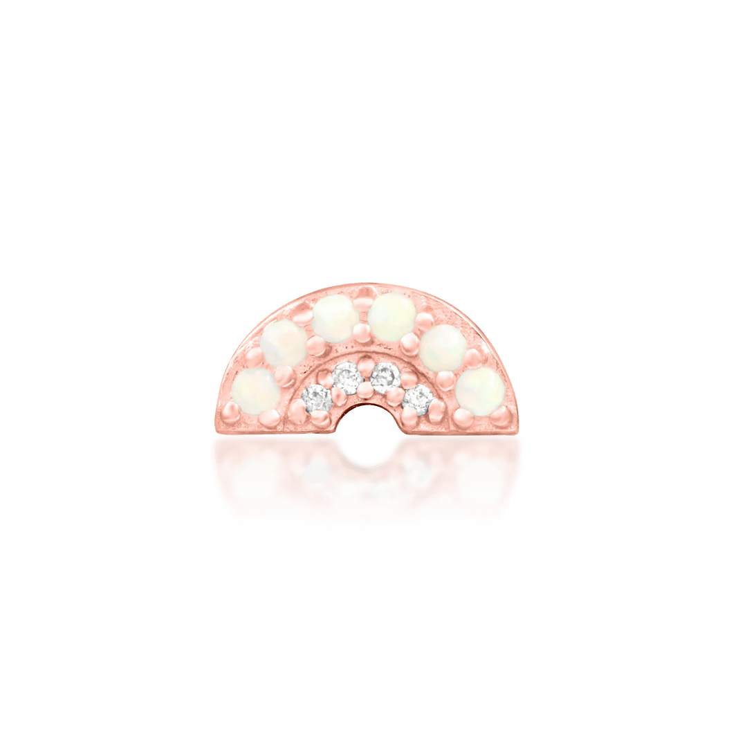Side profile of Archly jewelry in rose gold – curved structure and gems