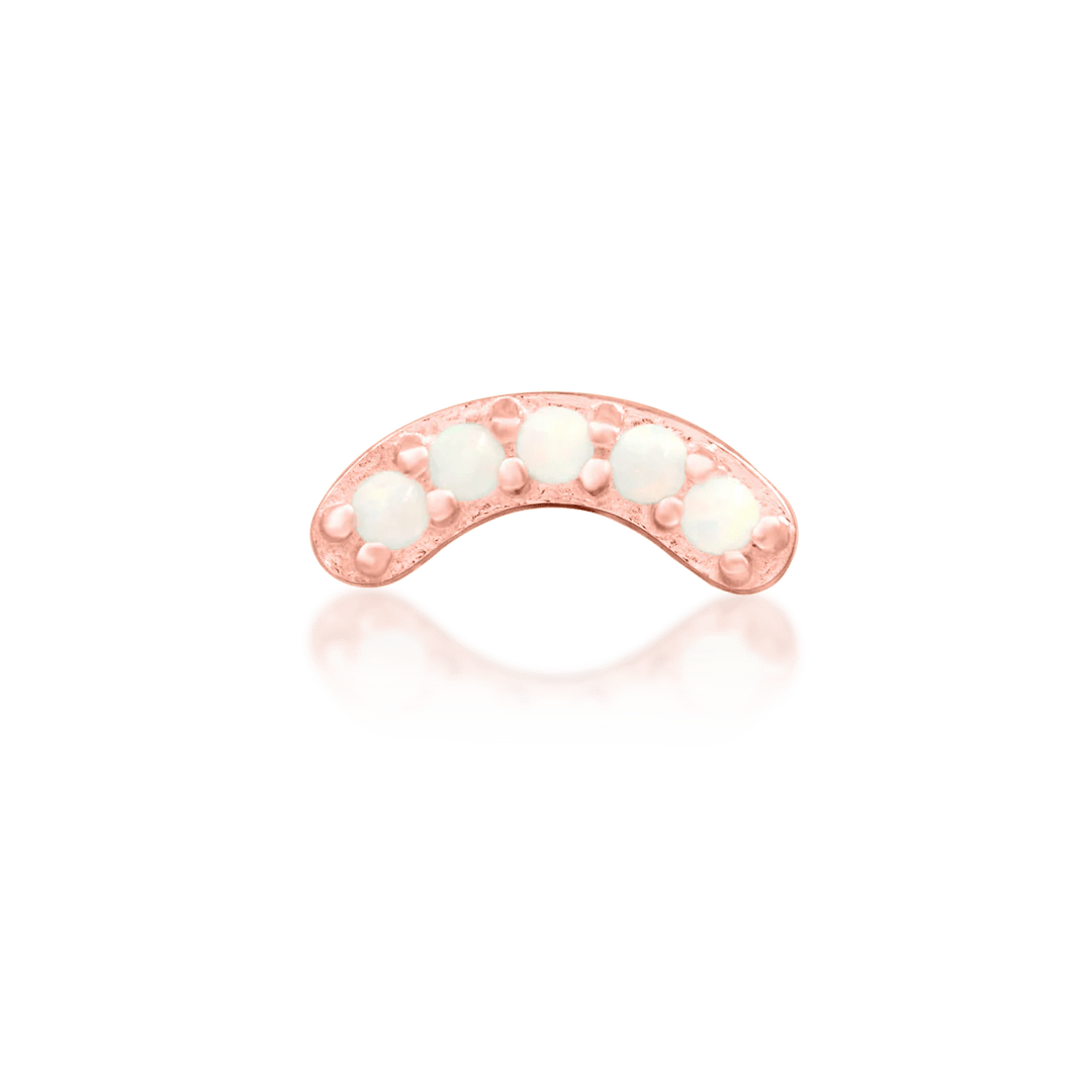 Side angle of Curven in rose gold – delicate arc and glowing opals
