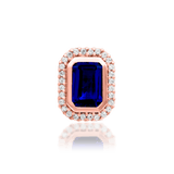 Elegant gold piercing jewelry with blue gemstone