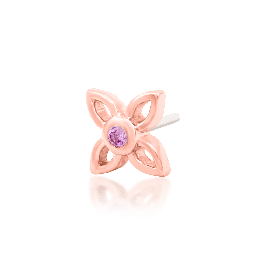 Styled piercing with Fleur – worn in helix or lobe for floral accent