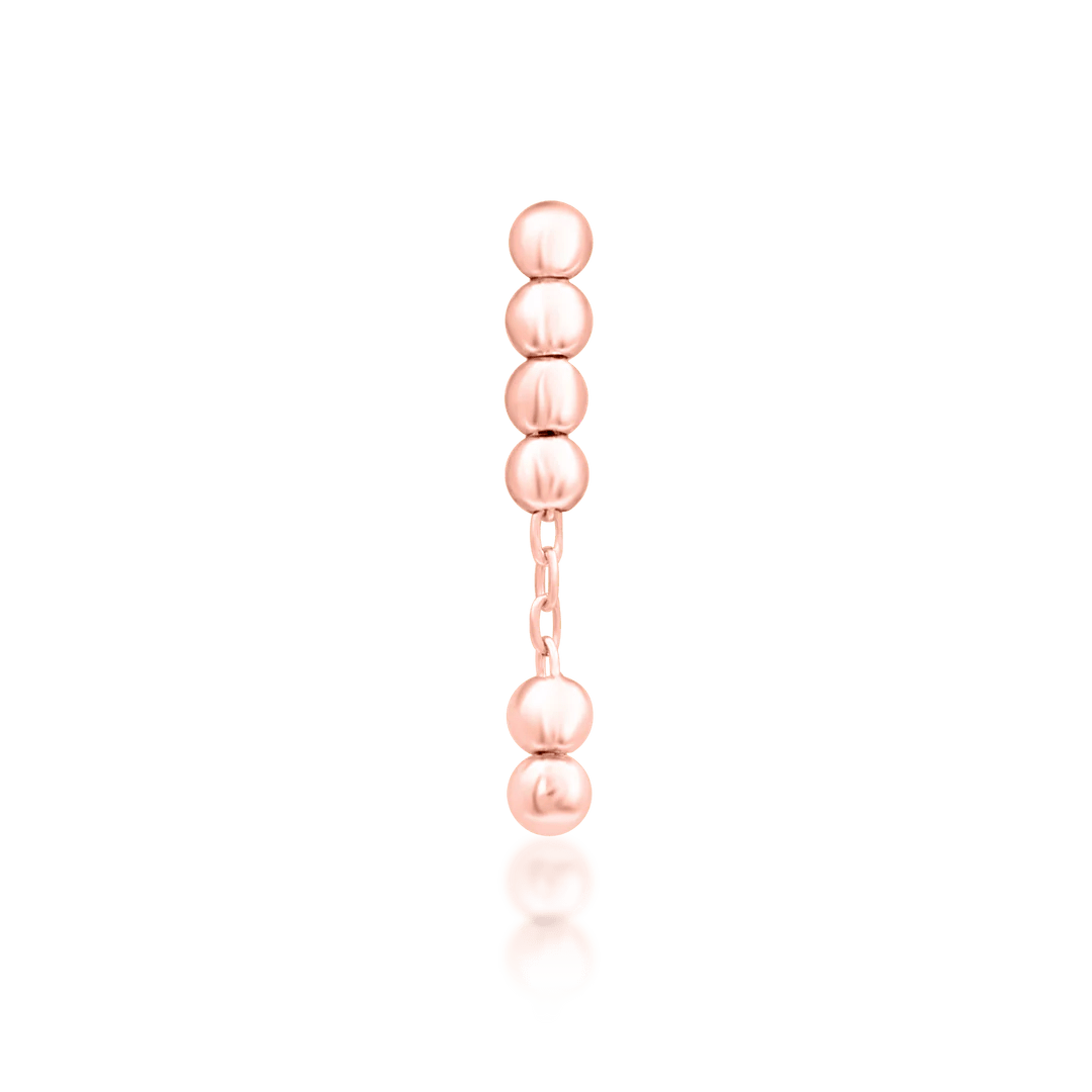 Side profile of Lennon in rose gold – sleek chain with gold bead accents