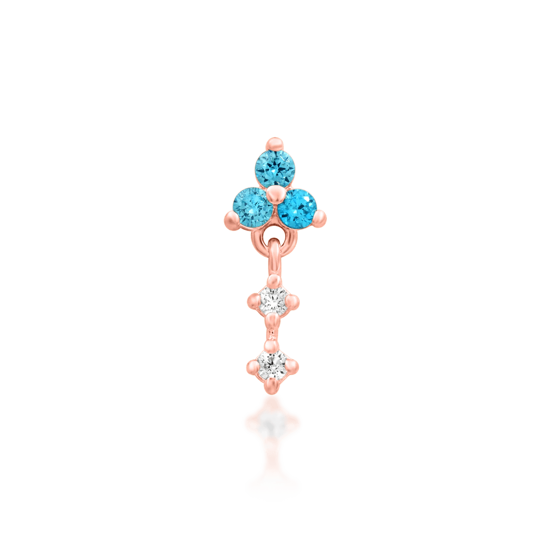 Minimalist gold piercing stud with blue gemstones