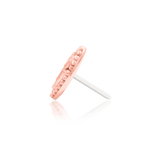 Model wearing Novie Gold End in Flat Piercing