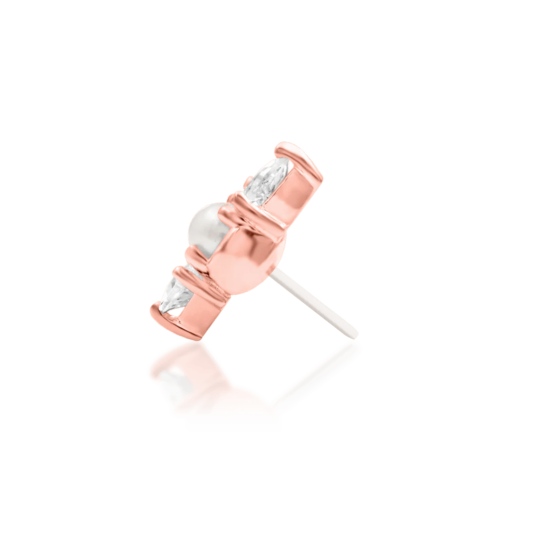 Subtle 14K gold jewelry piece with pearl and sparkle