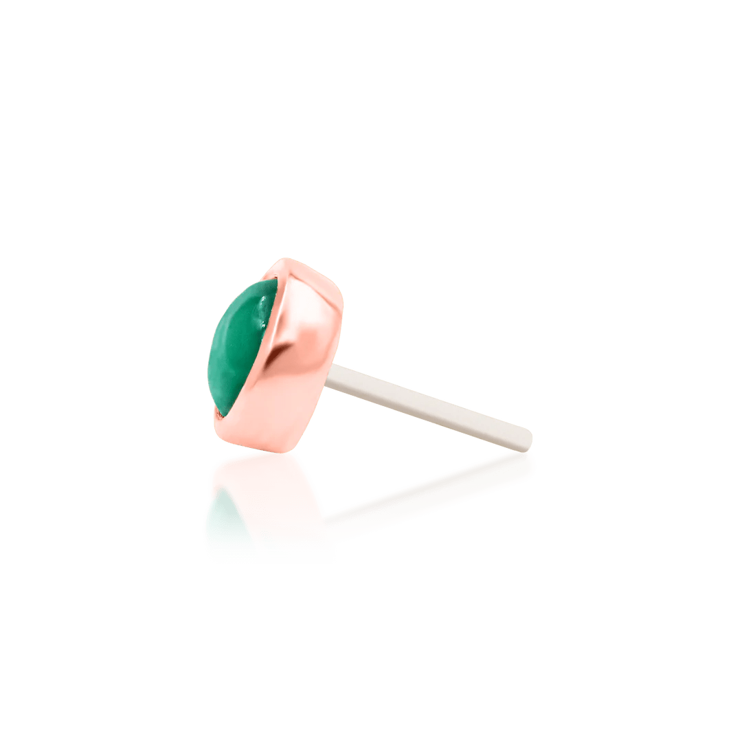 Close-Up of Verity Emerald End – Green Cabochon in Polished Bezel