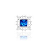 Blue Topaz Piercing Jewelry on White Background – Close Focus