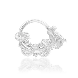 Close-up of dragon-motif clicker in white gold