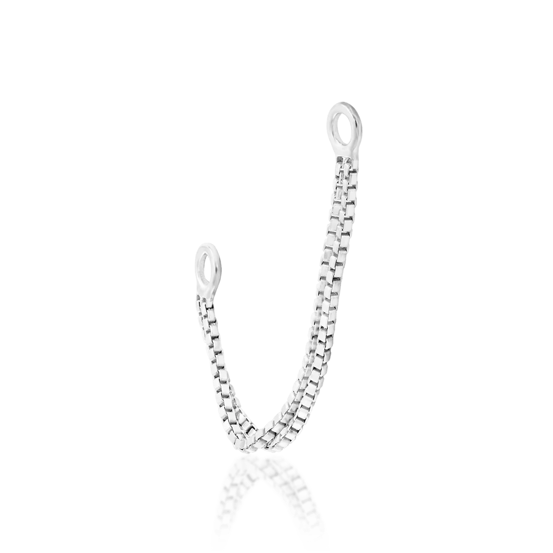 Double Box Chain Draped Across Conch and Flat Piercing – Style Example