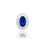 Close-Up of Genevive in Conch Piercing – Classic Oval-Cut Detail