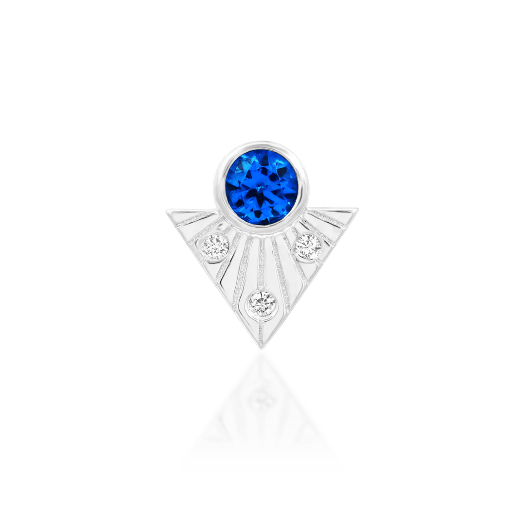 Haydn End in White Gold – Displayed on Jewelry Stand with Blue Topaz Center
