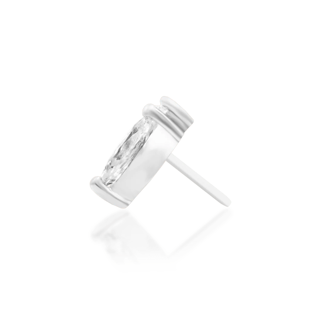 Orla End – Flat Lay of Minimalist Jewelry on White