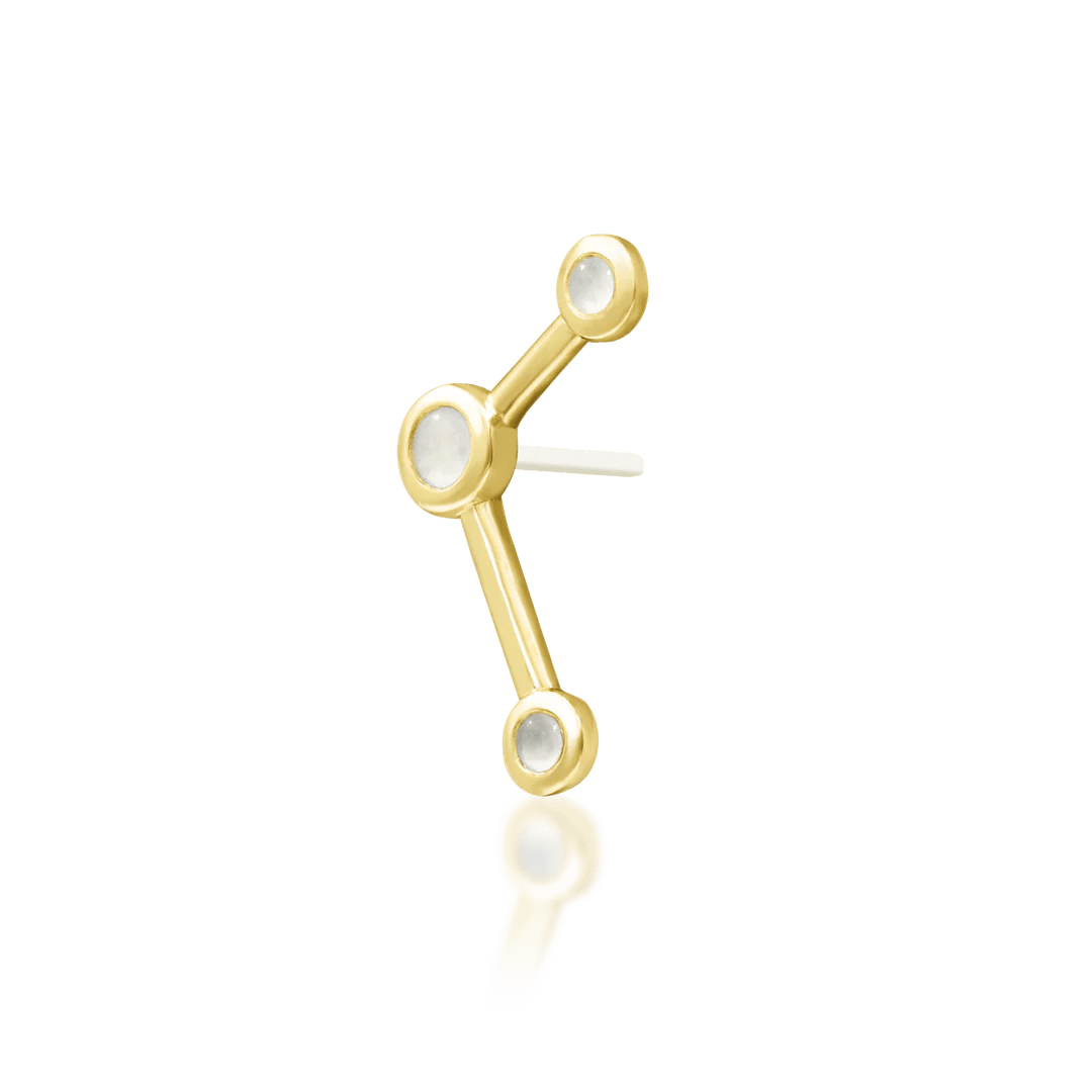 Top-down image of Asteria – celestial layout of three circular gems