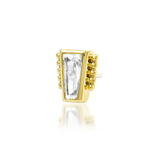 Close-up of baguette CZ framed in gold beading – elegant jewelry detail