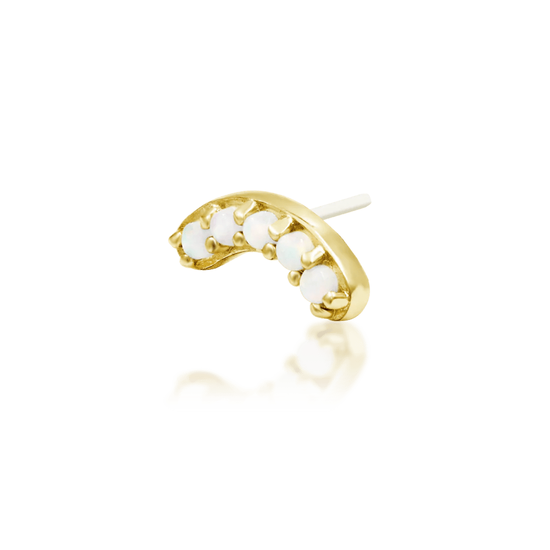 Top-down photo of Curven end – crescent silhouette with polished gold