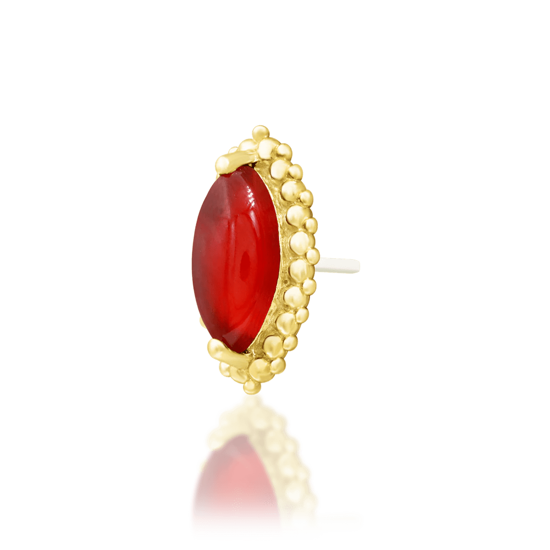 Top-down image of Fernley – polished setting and deep red centerpiece