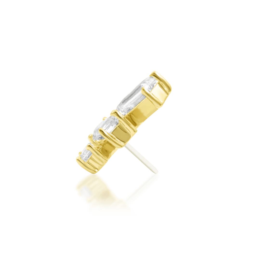 Modern fine jewelry for ear piercings in yellow gold with clear stones