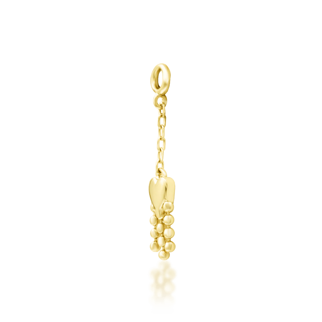 Top-down image of Je T’aime – bead details hanging from golden heart