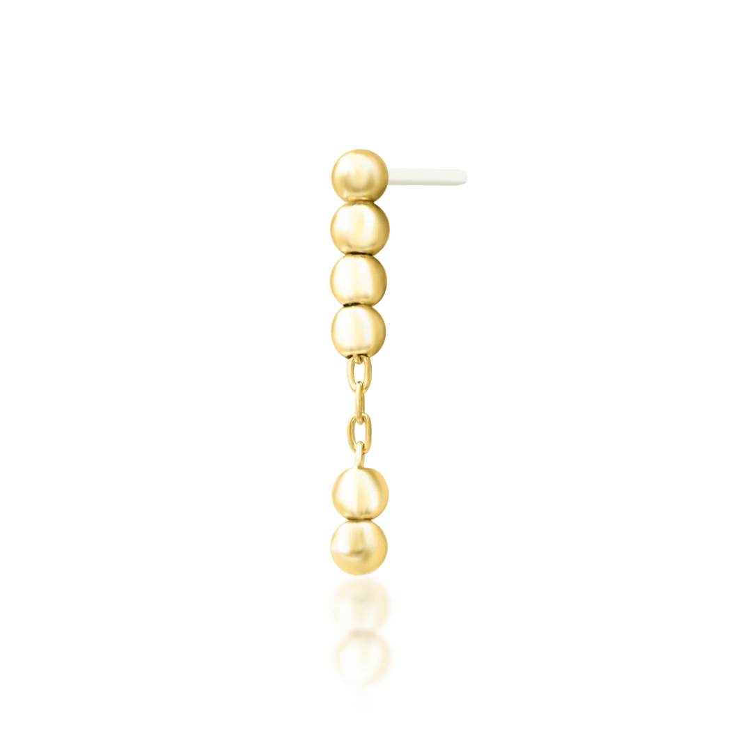 Top-down image of Lennon – elegant linked bead structure in gold