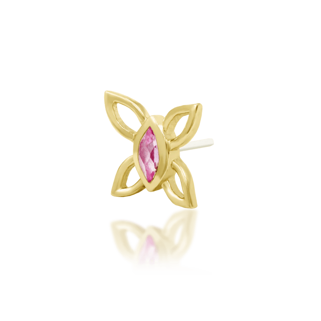 Top view of Navhvi threadless piece – pink gemstone and gold silhouette