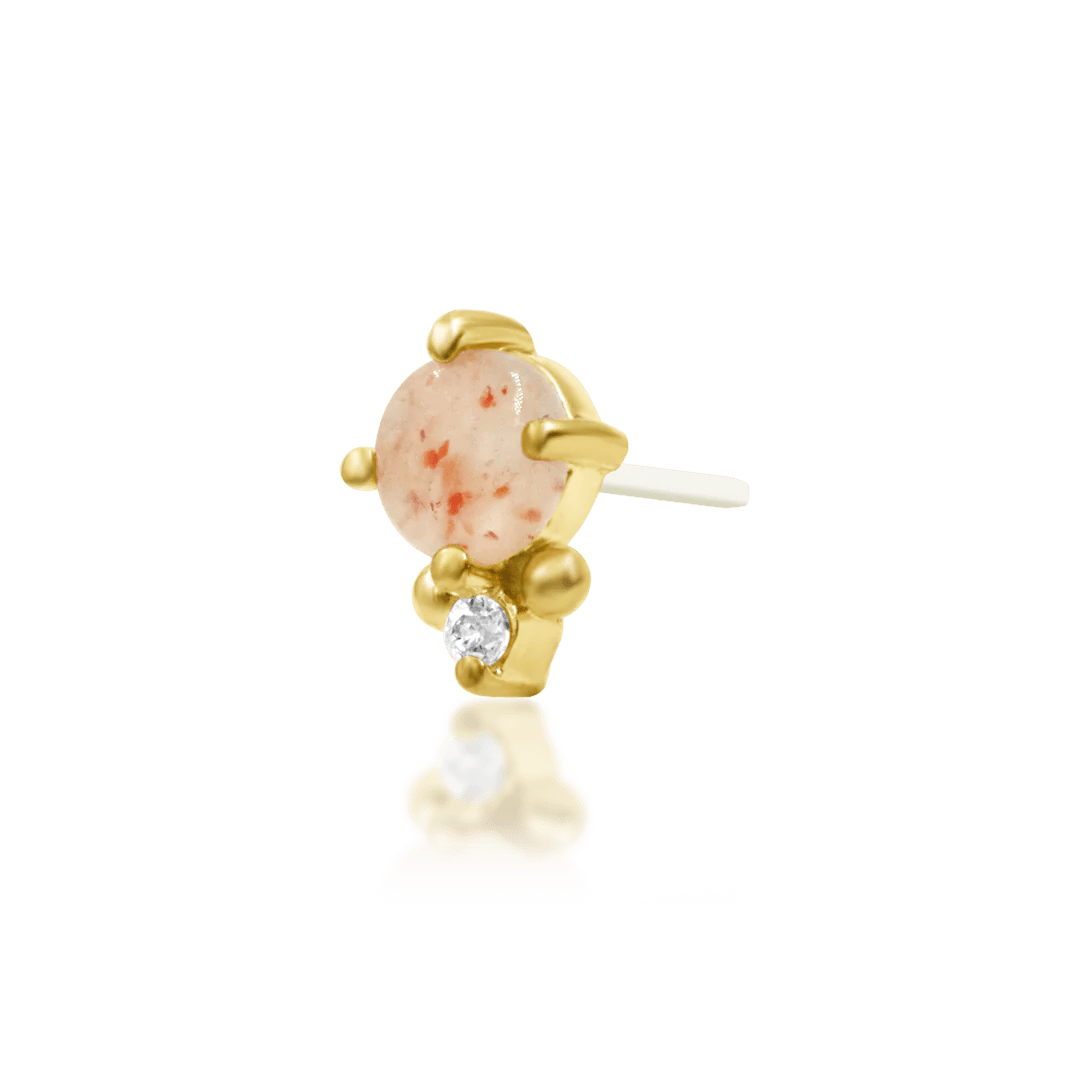 Top view of Rosalind threadless piece – sunstone and CZ layout on white