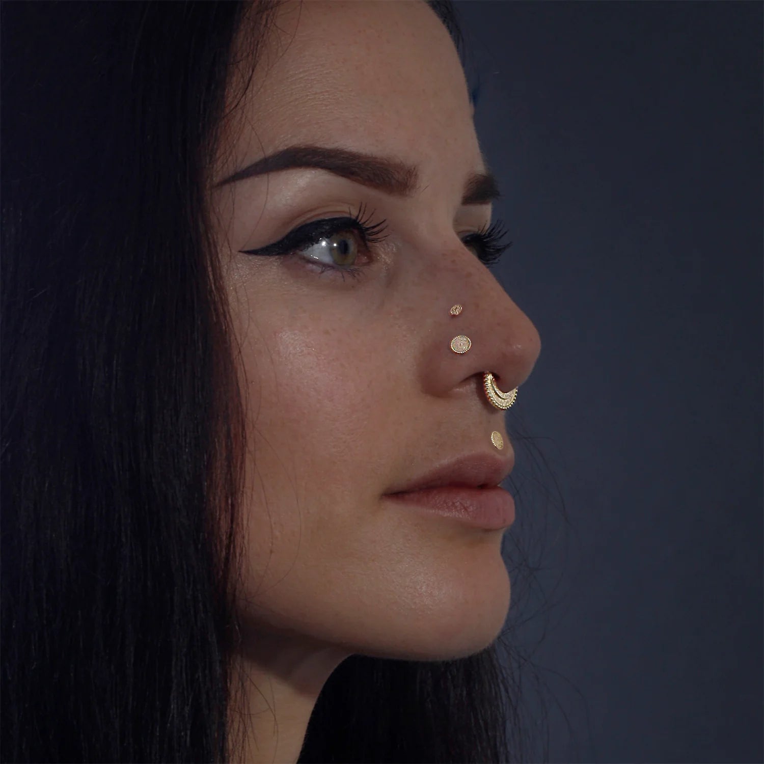 Hand-hammered 3mm gold disk for ear piercing