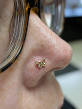 Model Wearing Butterfly in Helix Piercing – Minimalist Styling
