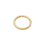 Close-up of Tokyo Clicker’s textured gold detailing
