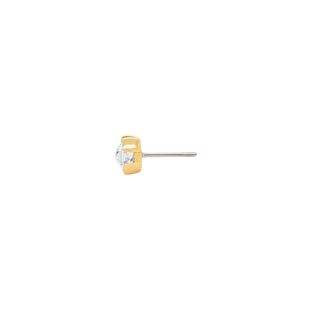 Flat-lay of 14k gold Peekaboo stud – elegant and compact CZ end
