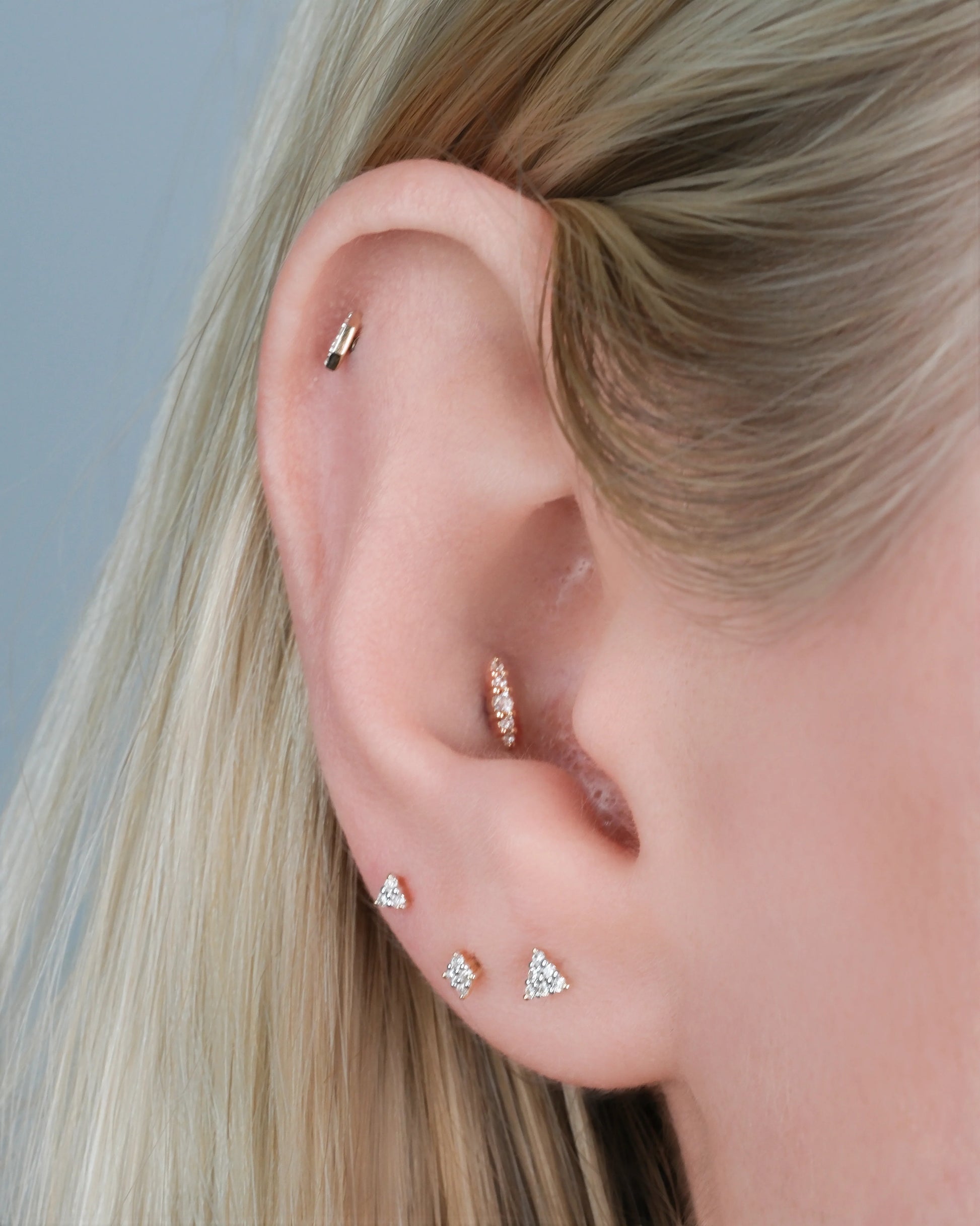 Styled ear with Nala diamond end – balanced and sparkling piercing look

