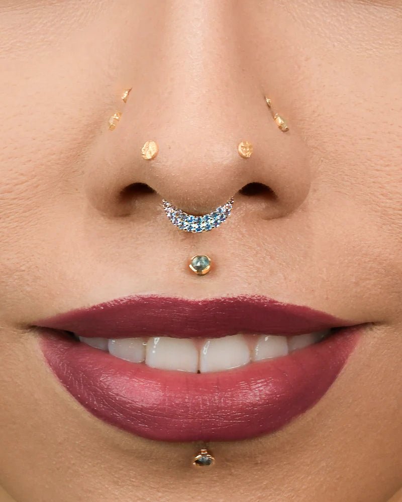Open clasp view of Metamorphosis clicker – hinged 14k gold ring with gemstone detailing