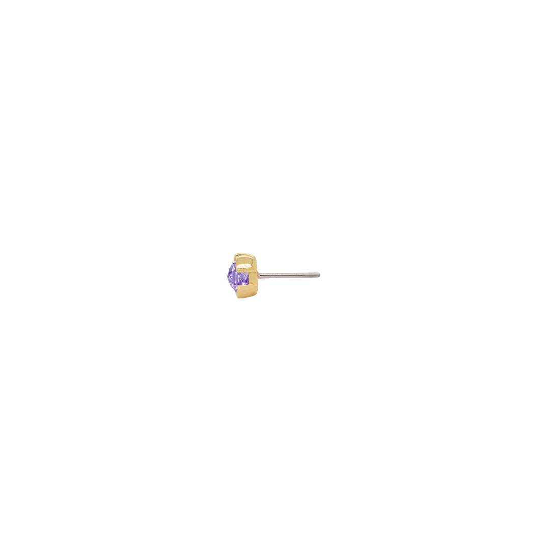 Flat-lay of 14k gold Peekaboo end featuring rose-cut amethyst